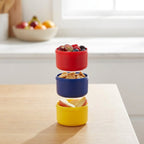 Stackable containers with snacks on a kitchen counter