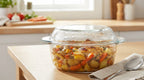 Glass casserole dish with a cooked dish on a kitchen counter