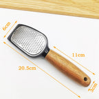 Grater with wooden handle and measurements on a white background