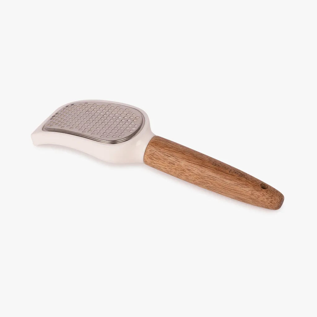 Pet grooming brush with wooden handle on a white background