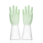 Pair of green and white gloves on a white background